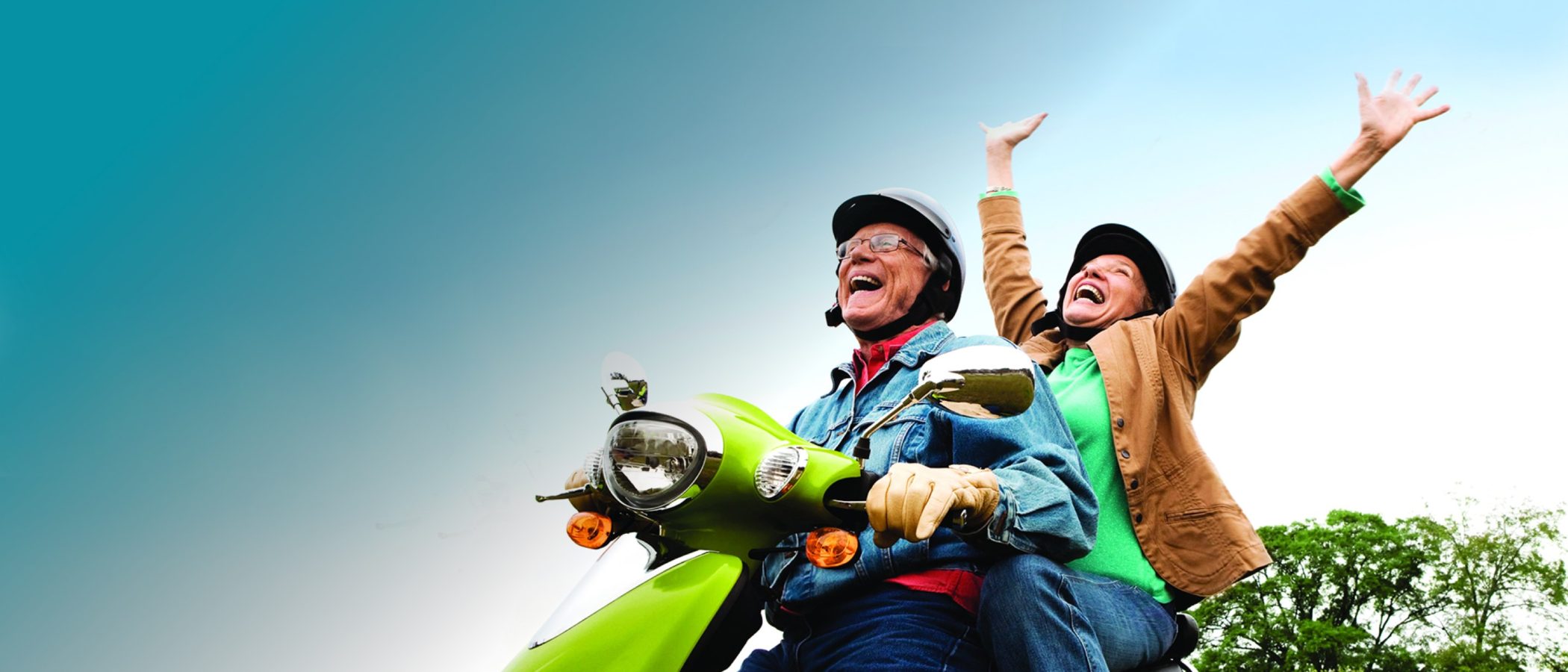 South East Chiropractic: man and woman enjoying retirement riding a motorcycle