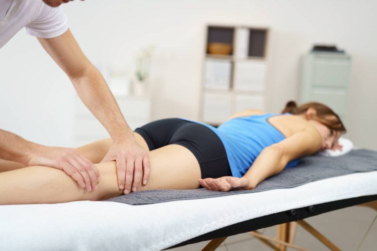 South East Chiropractic: person receiving leg massage at Victoria Point Chiropractic